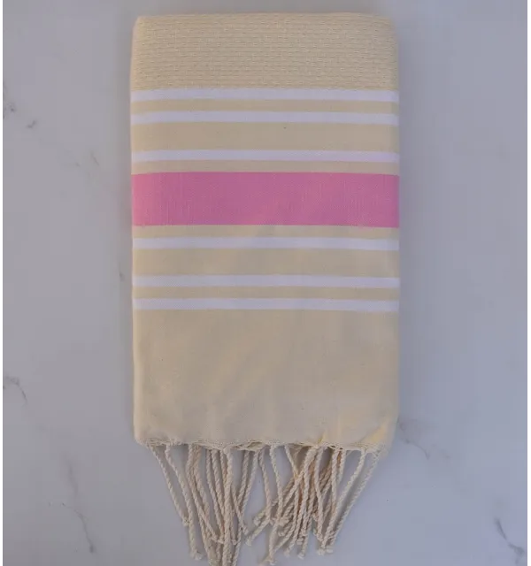 Fouta nid d'abeille jaune beurre rayée blanc et rose clair 