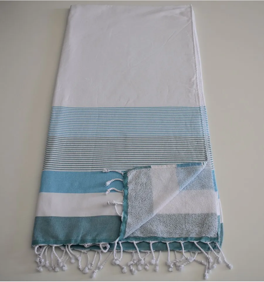 Fouta esponja blanca, azul celeste claro y pato 