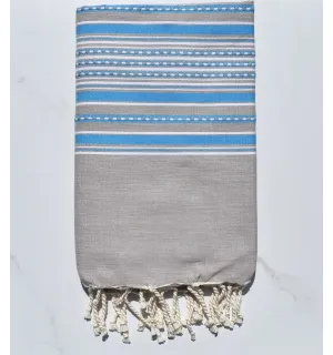 Fouta arabesco de color topo claro con rayas azules 