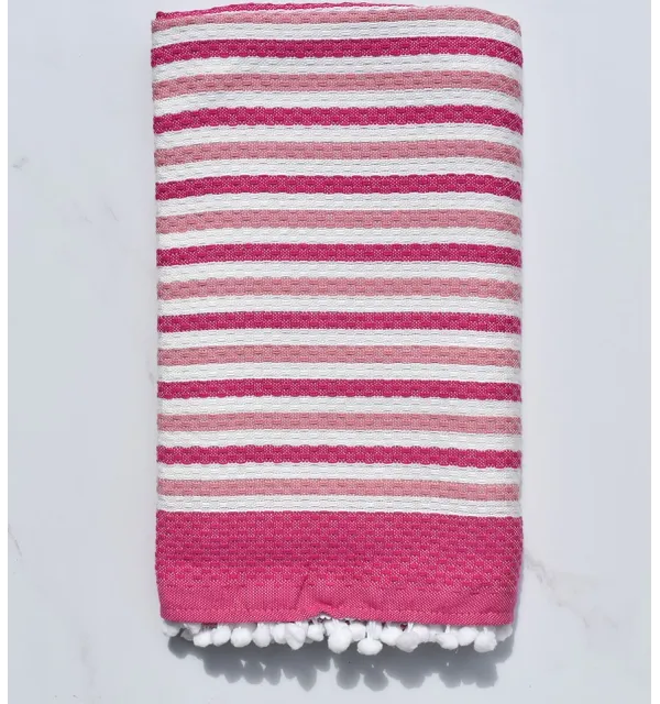 Fouta blanc cassé et rose avec pompons 