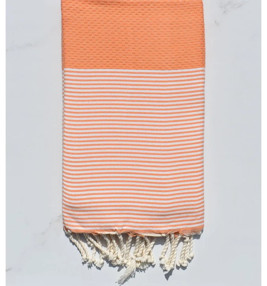 Fouta nid d'abeille orange saumon avec rayures 